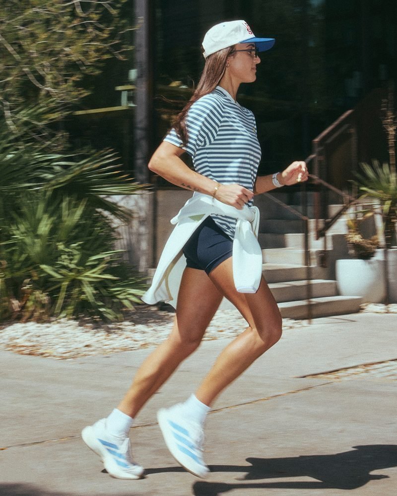 Runner in the Mariner Tee on an Austin sidewalk